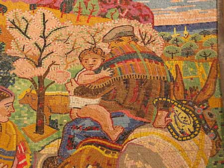 Mosaic of man and child on a donkey