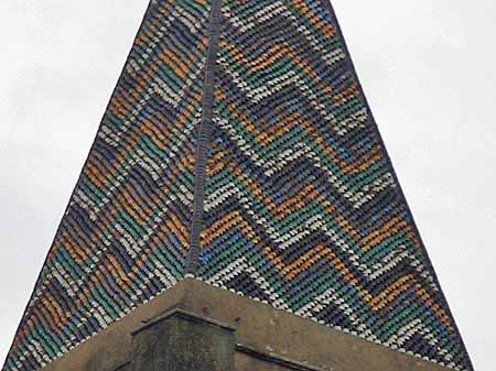 Coloured tiles on church spire