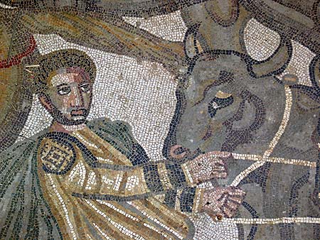 man pulling ox mosaic